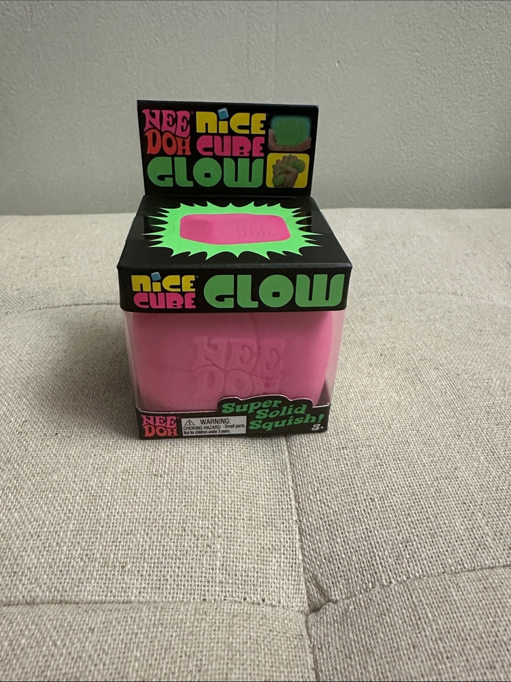 Brand new sealed NeeDoh Nice Cube Glow - Bright Pink Squish